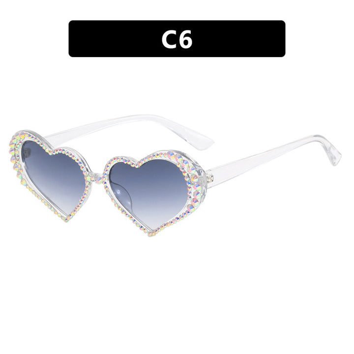 Dame hjerteformet solbrille med strassbesatt ramme Skanto