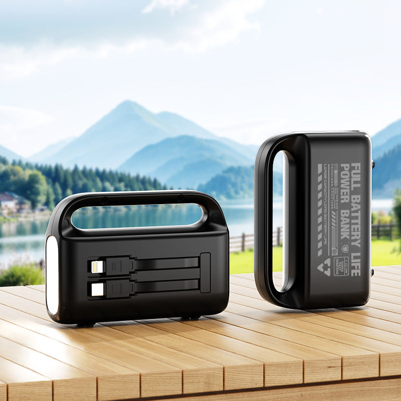 Bærbar powerbank med ergonomisk grep og integrerte ladeporter Skanto