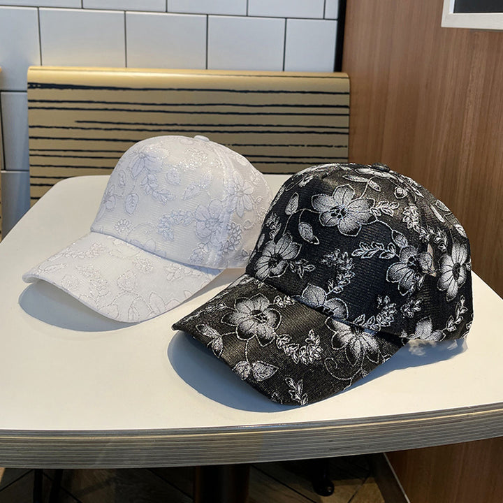 Kvinnens blomsterbroderte baseballcap Skanto