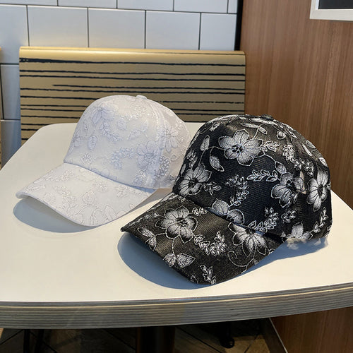 Kvinnens blomsterbroderte baseballcap Skanto