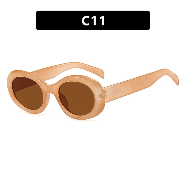 Dame moteriktig solbrille i original oval design med transparent ramme og UV-beskyttelse Skanto