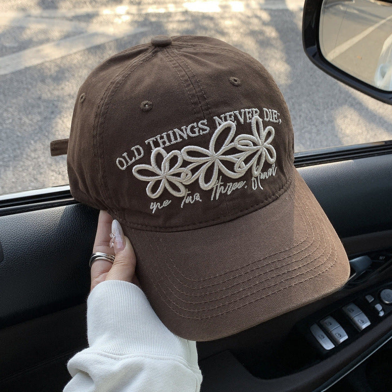 Kvinnens broderte denim caps Skanto