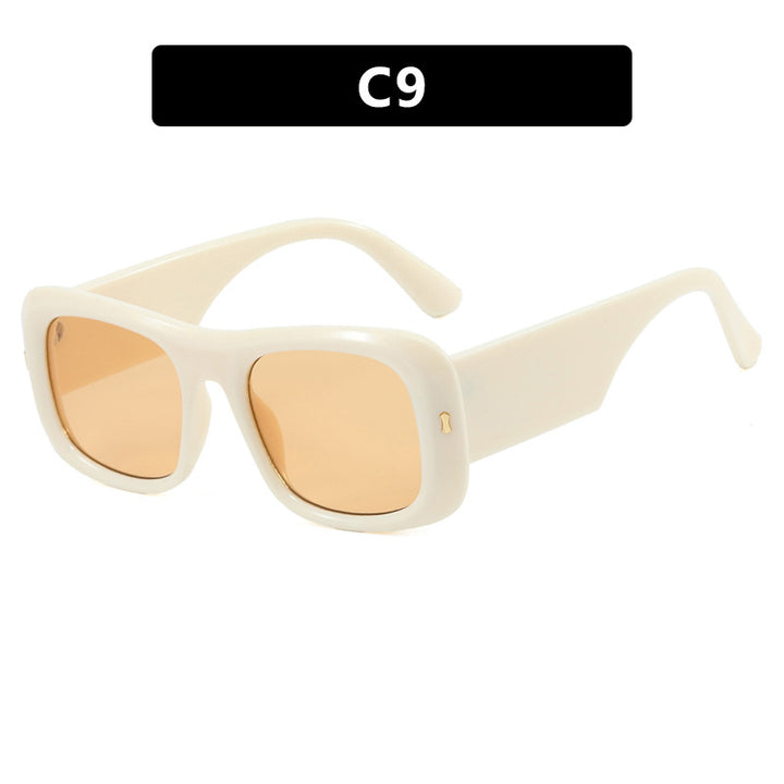 Damen kvadratisk solbrille med refleksjonsbeskyttende linser og moderne ramme konstruksjon Skanto