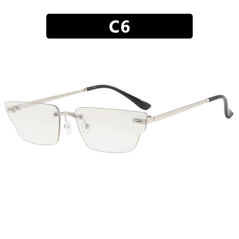 Dame geometrisk solbrille med filigranramme og transparente glass Skanto