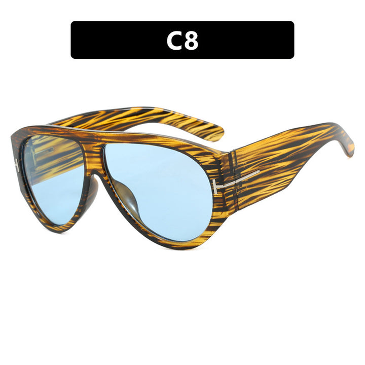 Dame elegant solbrille i markant design Skanto