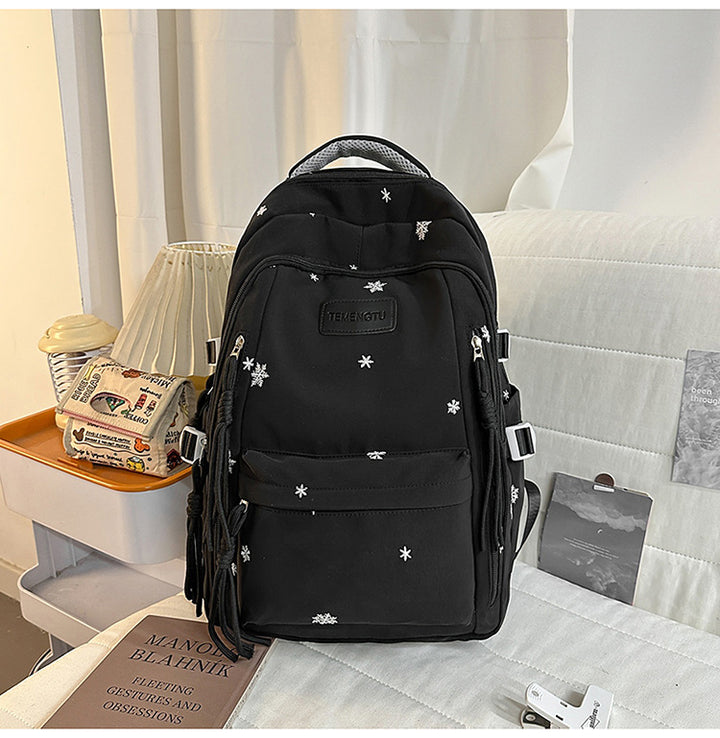 Elegant brodert skole ryggsekk