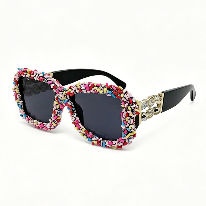 Dame solbrille med kreativ godtepryd Skanto