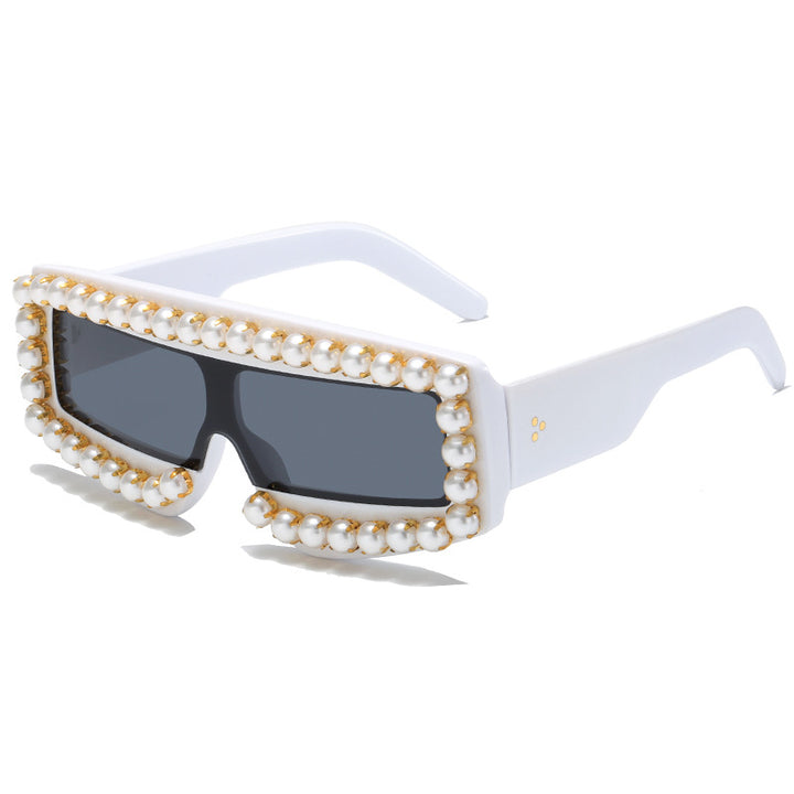 Dame moteriktig solbrille med perle-applikasjoner Skanto