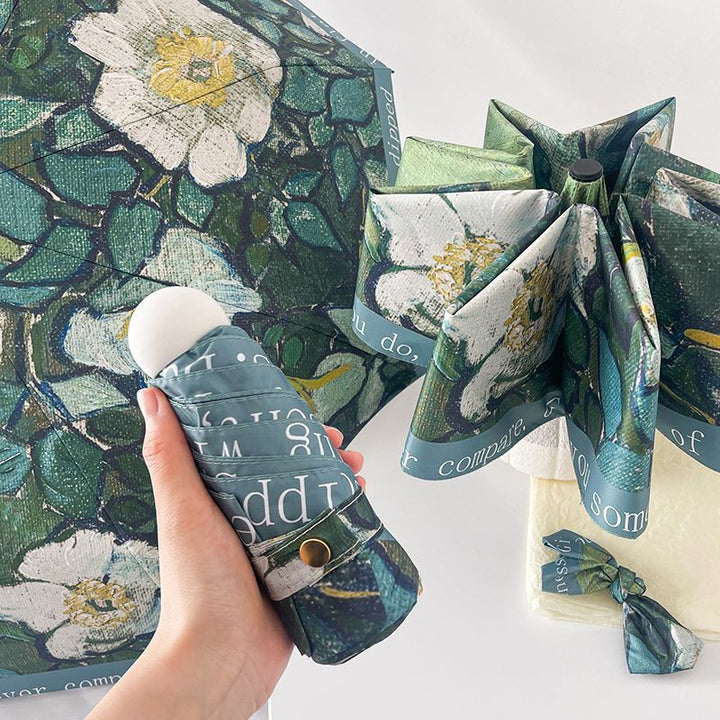 Damer sammenleggbart paraply med florale accenter Skanto