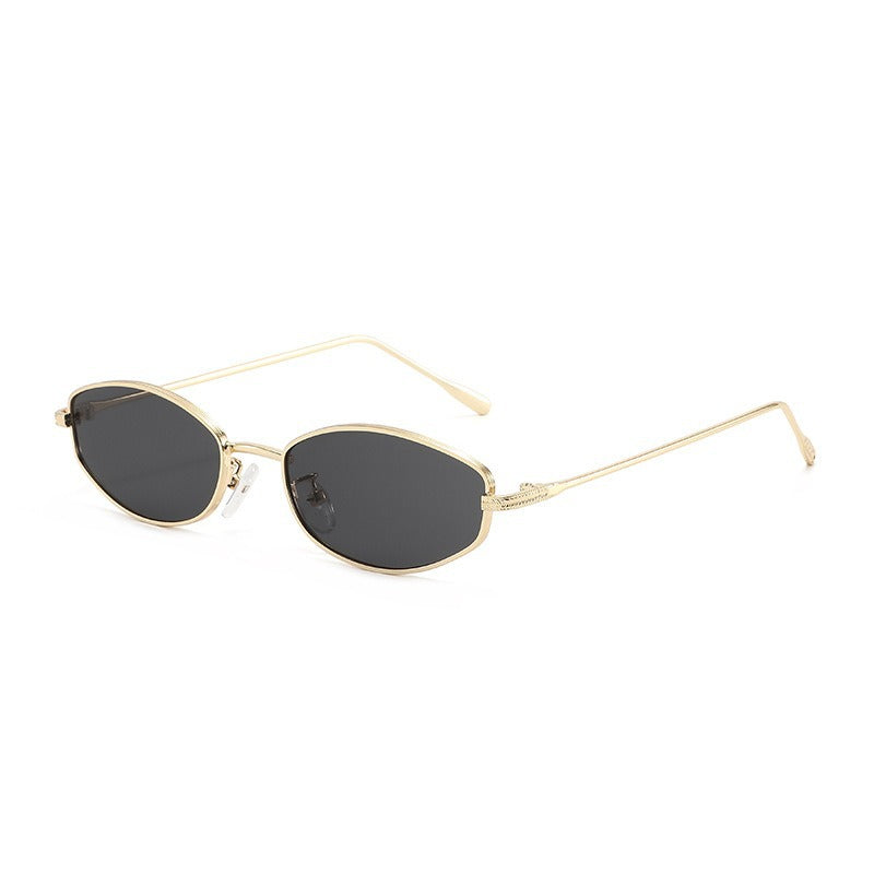Dame moteriktig solbrille i minimalistisk ovalt design Skanto