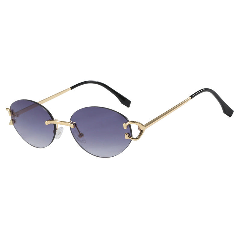 Dame elegant ovalformet solbrille med moderne metalramme Skanto