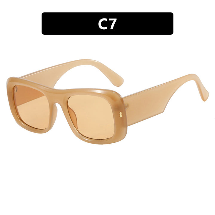 Damen kvadratisk solbrille med refleksjonsbeskyttende linser og moderne ramme konstruksjon Skanto