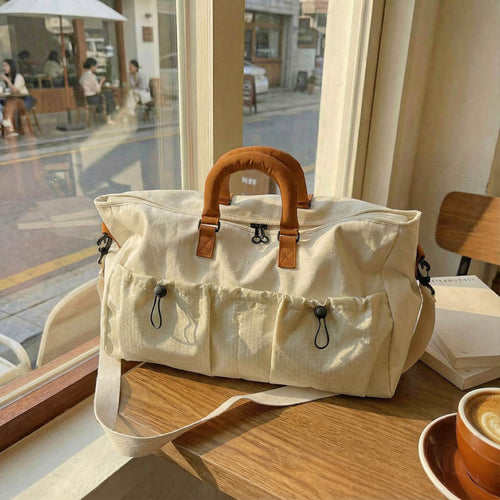 Handleveske i urban design med allsidige rom Skanto