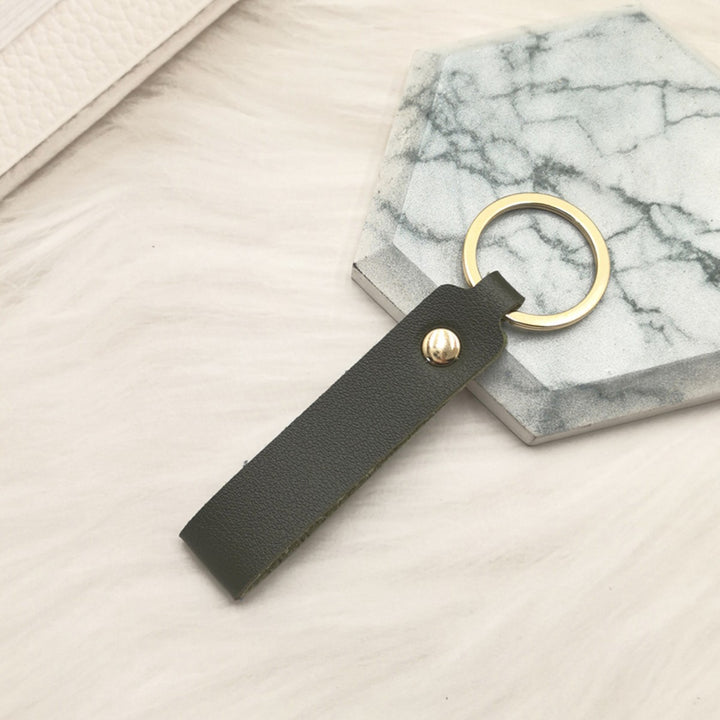 Unisex nøkkelring laget av høykvalitets kunstskinn med elegant metalldekor Skanto