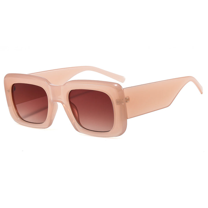 Dame oversized solbriller med kvadratisk ramme og transparent design Skanto
