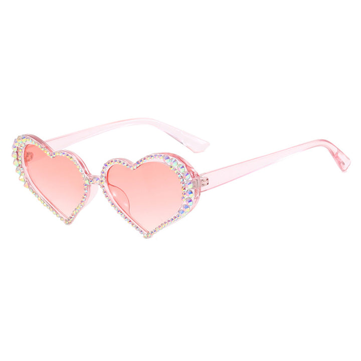 Dame hjerteformet solbrille med strassbesatt ramme Skanto