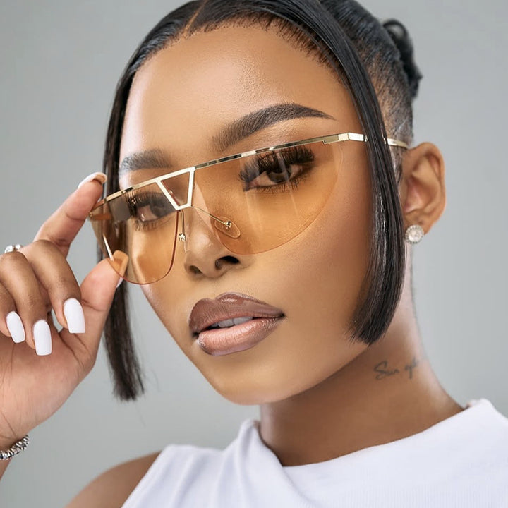 Dame futuristisk solbrille med beskyttende metallramme Skanto