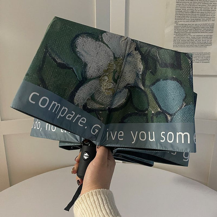 Damer sammenleggbart paraply med florale accenter Skanto