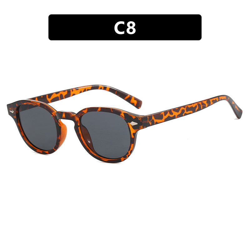 Dame rund solbrille med elegant design og UV-beskyttelse Skanto