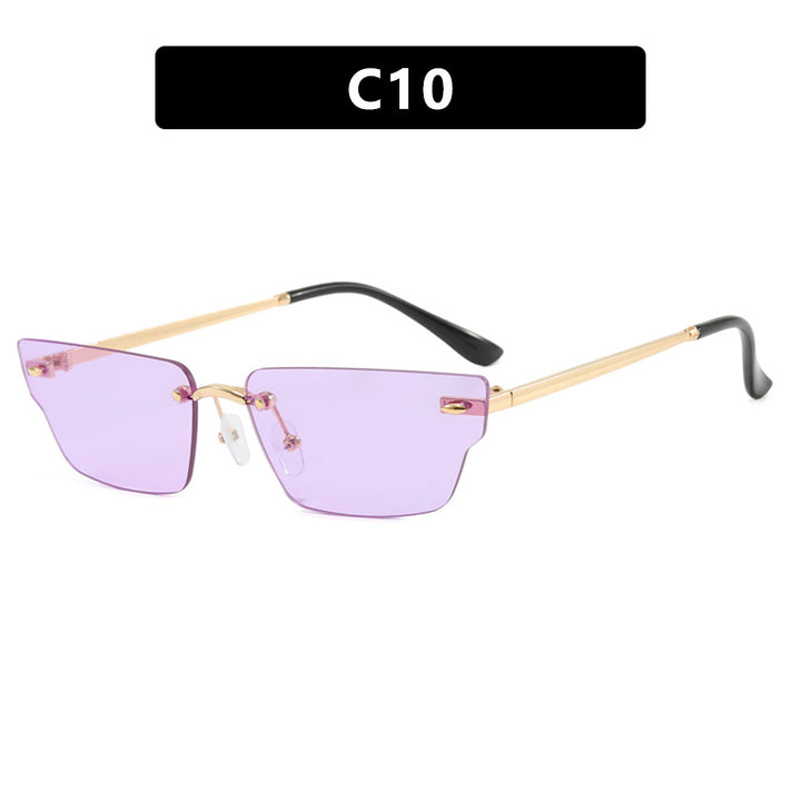 Dame geometrisk solbrille med filigranramme og transparente glass Skanto