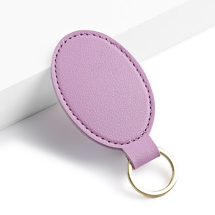 Unisex nøkkelring i høy kvalitet av kunstskinn med stiløs design Skanto