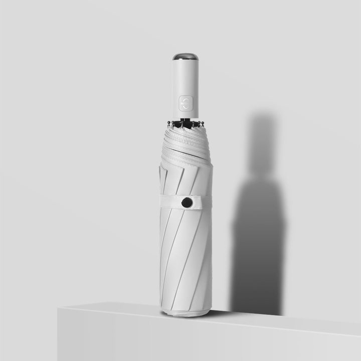 Damehåndholdt paraply med robust ramme og reflekterende elementer Skanto