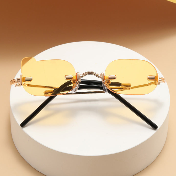 Damer eksklusiv modisk solbrille med glinsende metallramme Skanto
