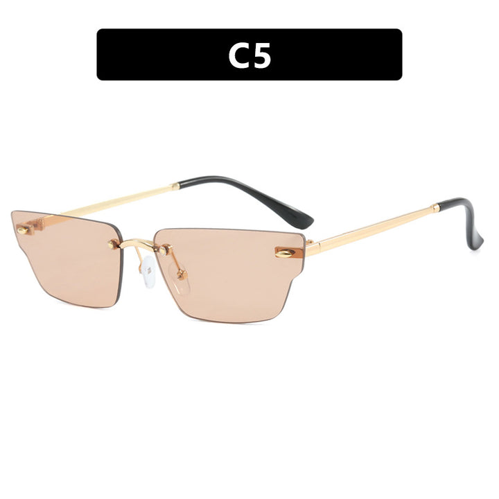 Dame geometrisk solbrille med filigranramme og transparente glass Skanto