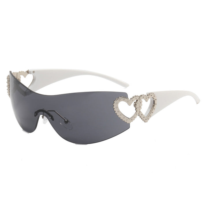 Dame sporty solbriller i trendy shield-design med hjerte-akenter Skanto