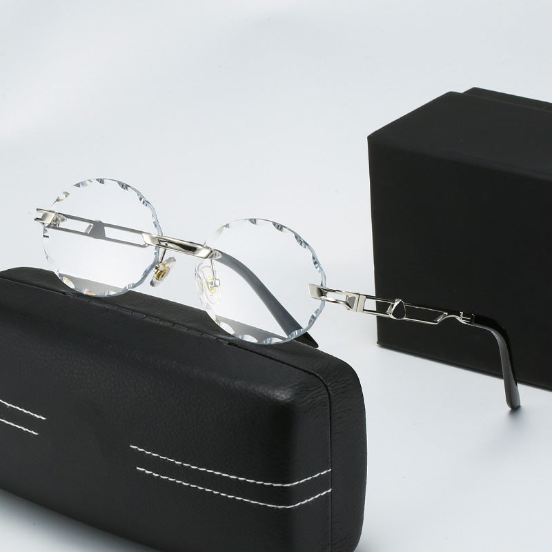 Dame rund solbrille med unikt bølgedesign og høykvalitets metallramme Skanto