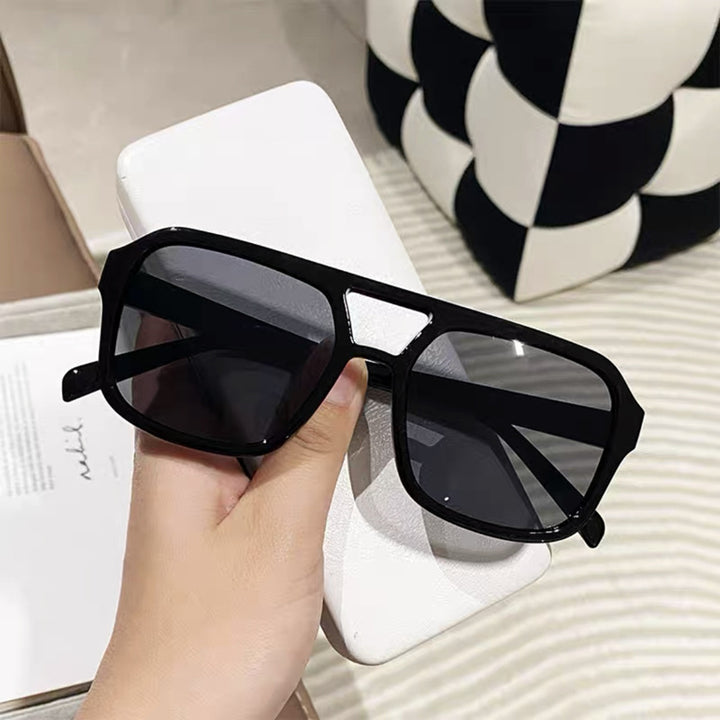 Dame modische Oversized-solbrille med iøynefallende mønster Skanto