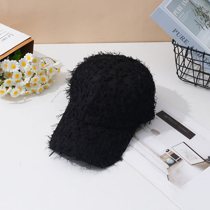 Kvinnebrodert teksturert baseballcap Skanto
