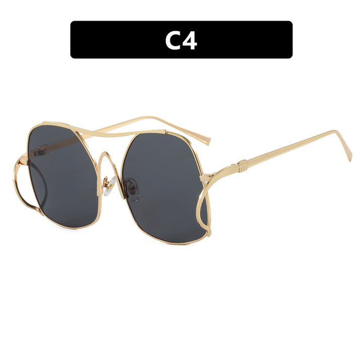 Dame geometrisk solbrille med smal metallramme og brune glass Skanto