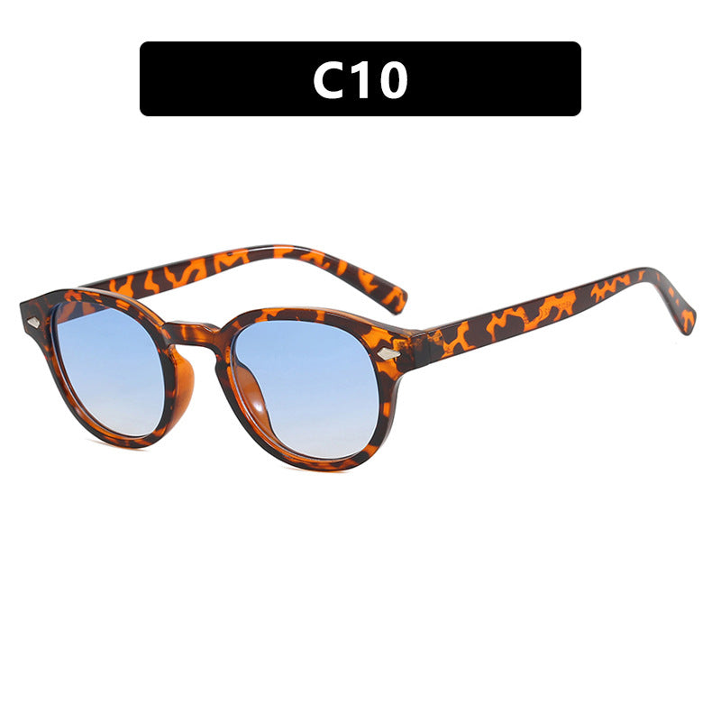 Dame rund solbrille med elegant design og UV-beskyttelse Skanto