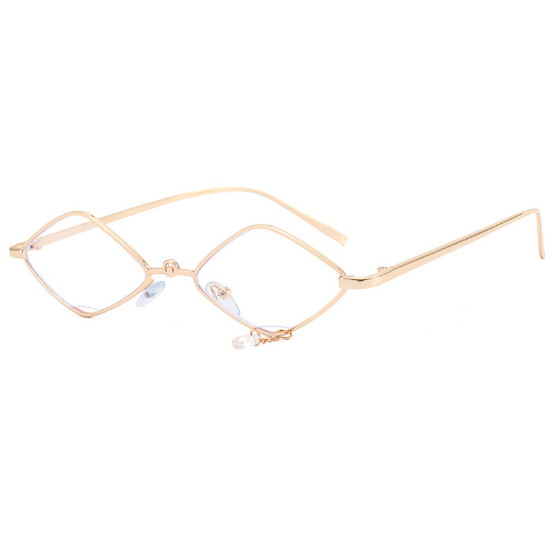 Dame moteriktig solbrille med fasettert ramme Skanto