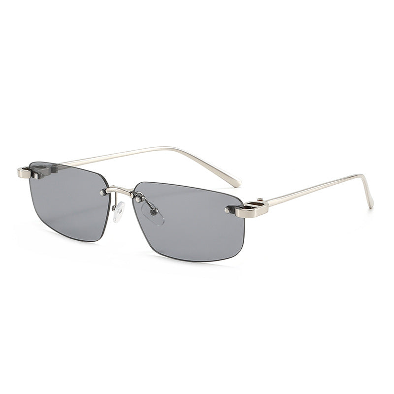 Dame moteriktig rektangulær solbrille med minimalistisk ramme Skanto