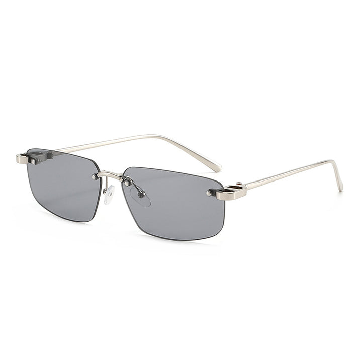 Dame moteriktig rektangulær solbrille med minimalistisk ramme Skanto