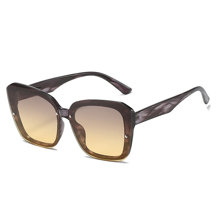 Damer oversized kvadratisk solbrille med sofistikert ramme Skanto