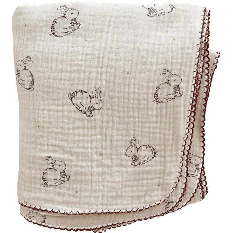 Unisex Musselinteppe med delikat blomsterdesign og elegante volanger Skanto