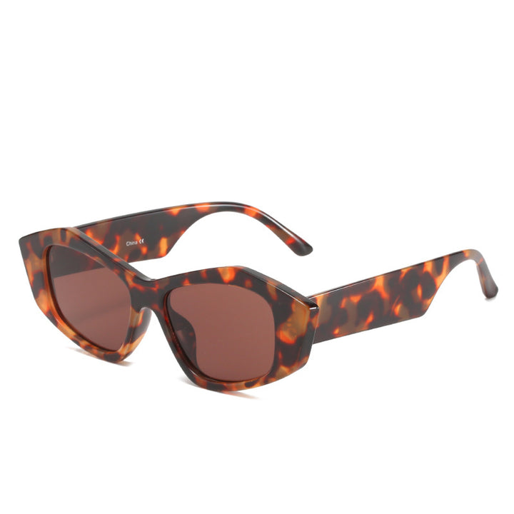 Dame geometrisk solbrille med unik, futuristisk design Skanto
