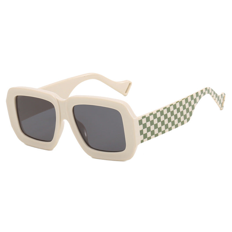 Dame moterik solbrille med kvadratisk design og stilig mønster Skanto