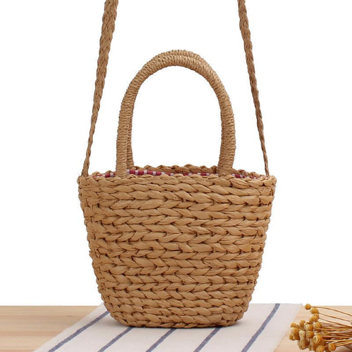 Umhengerbag av flettet naturmateriale Skanto