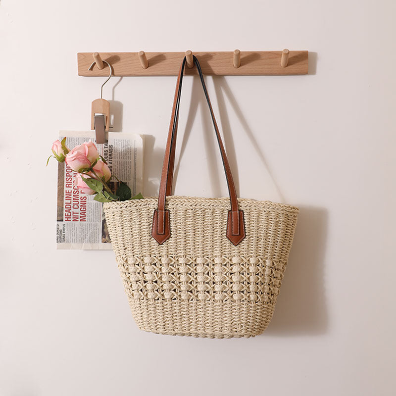 Håndlaget rattan kurvveske med elegante lærdetaljer Skanto
