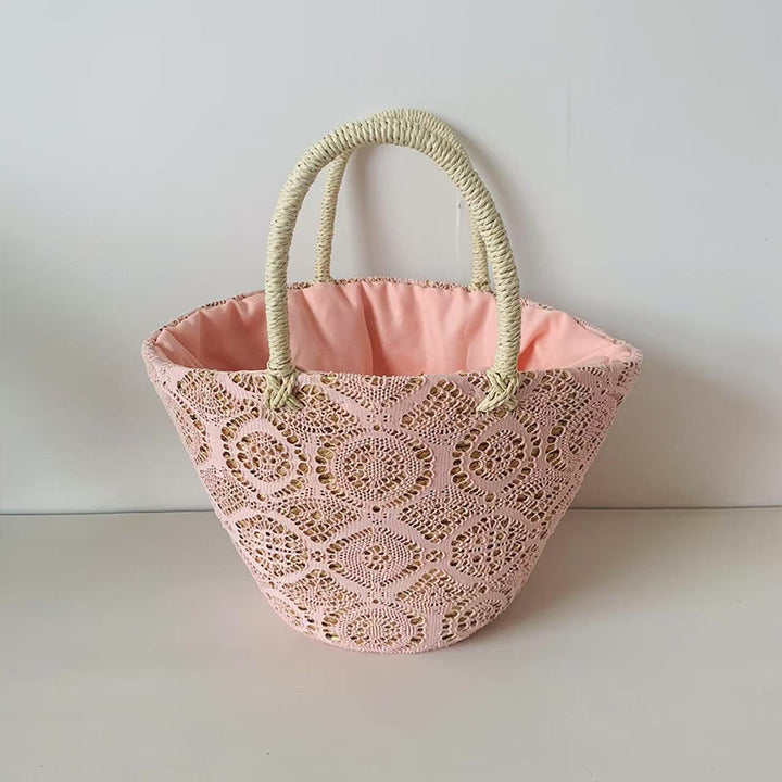 Kurvveske med elegant, flettet design Skanto