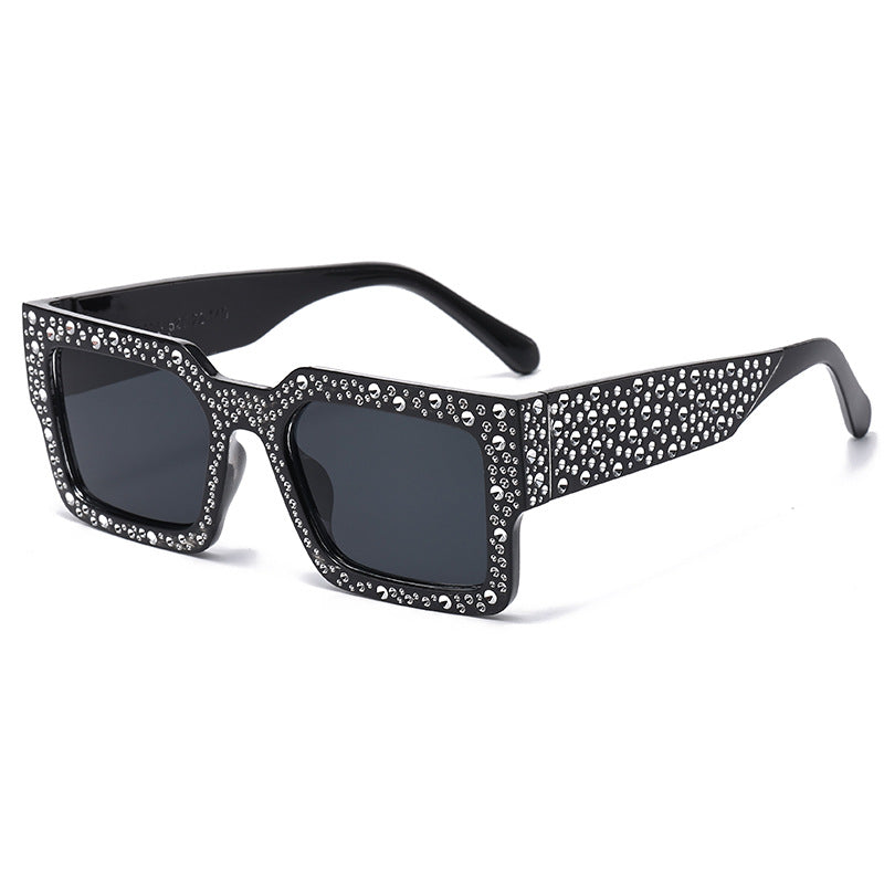 Dame ekstravagant solbrille med glitrende aksent Skanto