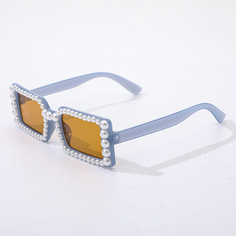 Dame stilig solbrille med perlepynt Skanto