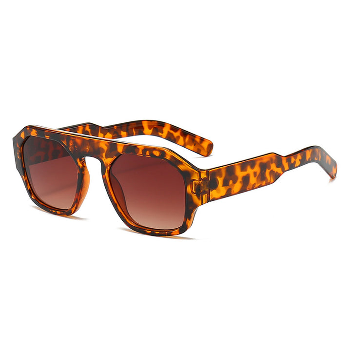 Dame motetrender solbrille i innovativ geometrisk design Skanto