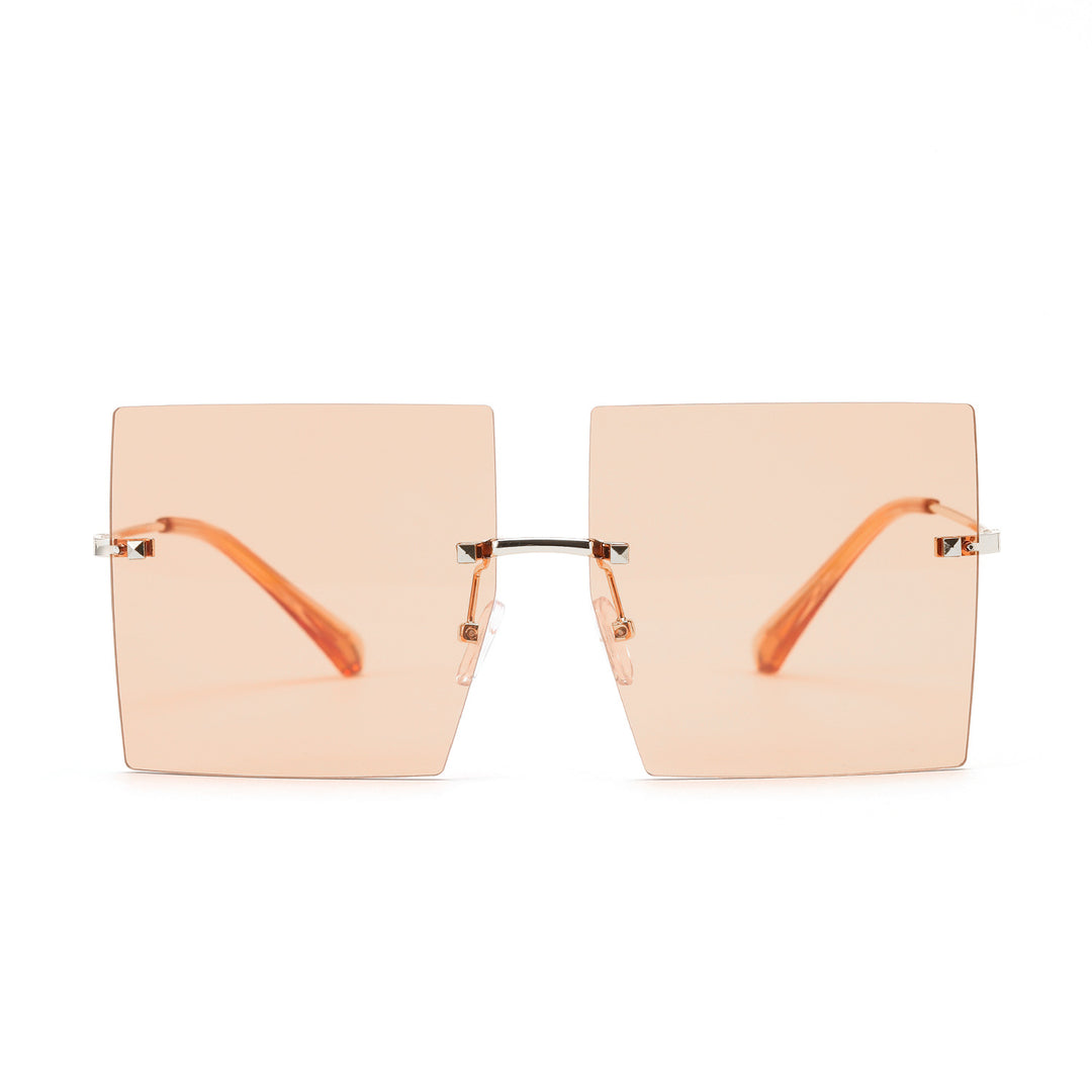Dame moteriktig kvadratisk solbrille med brede glass og filigran metallramme Skanto