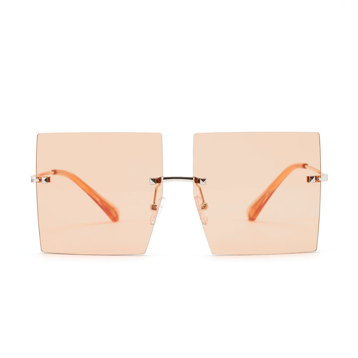 Dame moteriktig kvadratisk solbrille med brede glass og filigran metallramme Skanto
