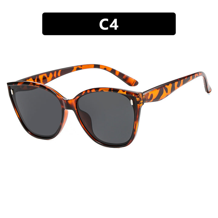 Dame Cat-Eye solbriller med beskyttende UV-filter og stilfull ramme Skanto